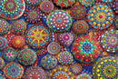 Colorful Meditative Mandala Stones jigsaw puzzle featuring intricately designed stones with vibrant patterns. The image showcases a variety of round stones in bright colors including reds, blues, greens, and yellows, all with detailed mandala designs. Perfect for relaxation and mindfulness activities, ideal for both adults and children.