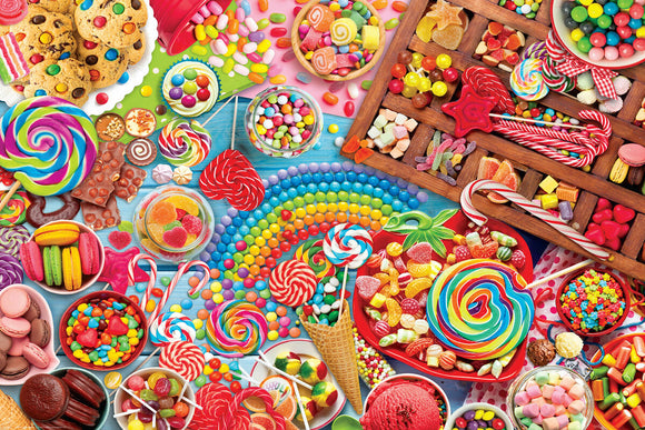 A colorful jigsaw puzzle titled 'Candy Party' by Eurographics, featuring a vibrant assortment of candies, lollipops, chocolates, and cookies, all arranged in a playful, eye-catching display. The scene is filled with textures and colors, including rainbow candy beads, jellybeans, and an array of sweets in various shapes and sizes.