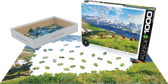 Eurographics Mountain Elk jigsaw puzzle featuring a scenic view of elk in a mountainous landscape. The 1000-piece puzzle is partially completed, with vibrant greens and blues showcasing nature. The puzzle box is displayed alongside the pieces, highlighting the high-quality imagery and design.
