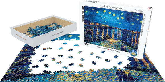 Starry Night Over the Rhone jigsaw puzzle by Eurographics featuring Vincent van Gogh's iconic artwork. The box is open, showing a portion of the assembled puzzle surrounded by an array of scattered pieces. The puzzle contains 1000 pieces, offering a challenging and enjoyable experience for art lovers and puzzle enthusiasts alike.