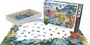 Air Balloons Over Cappadocia jigsaw puzzle by Eurographics featuring a vibrant scene of colorful hot air balloons ascending over the unique landscape of Cappadocia, Turkey. The image showcases the puzzle pieces scattered on a table alongside the puzzle box, highlighting the intricate details and colors of the artwork.