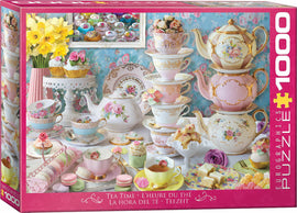 A beautifully illustrated jigsaw puzzle titled 'Tea Time' by EuroGraphics. The image features an elegant tea set with floral designs, stacked teacups, and an assortment of colorful macarons and pastries on a delicate table setting. Vibrant daffodils and ornate tea accessories create a delightful tea party atmosphere.