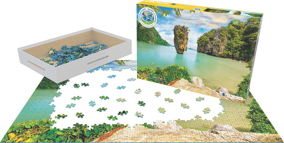 A Eurographics jigsaw puzzle titled 'Pacific Islands'. The image shows the puzzle box with scenic ocean and rock formations, alongside scattered puzzle pieces and an assembled section showcasing vibrant greens and blues.