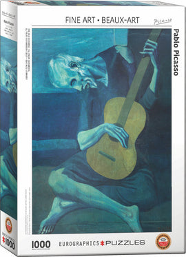 Jigsaw puzzle featuring Pablo Picasso's 'Old Guitarist,' showcasing a somber, expressive portrait of an elderly man playing a guitar, with a blue-toned palette. The puzzle contains 1000 pieces and is made by EuroGraphics.