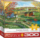 Eurographics jigsaw puzzle titled 'Pumpkin Season' featuring a vibrant autumn landscape with colorful trees, farms, and a variety of pumpkins. The puzzle box displays an 'XL Pieces' label, indicating larger pieces suitable for family fun. Beautiful artwork by Bob Fair complements the delightful seasonal theme, making it perfect for family gatherings and cozy nights in.