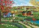 This jigsaw puzzle titled 'Pumpkin Season' by Eurographics depicts a quaint autumn scene featuring a vibrant farmhouse surrounded by colorful fall foliage. In the foreground, a dirt path leads to a pumpkin patch with villagers harvesting pumpkins, horse-drawn carts, and sheep grazing nearby. The background showcases rolling hills dotted with farms and trees in full autumn colors, creating a warm and inviting rural landscape.