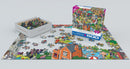What Could Go Wrong? jigsaw puzzle by Eurographics featuring a vibrant, humorous scene with whimsical characters, 500 pieces spread out on a flat surface, with the box displayed alongside a partially completed puzzle.