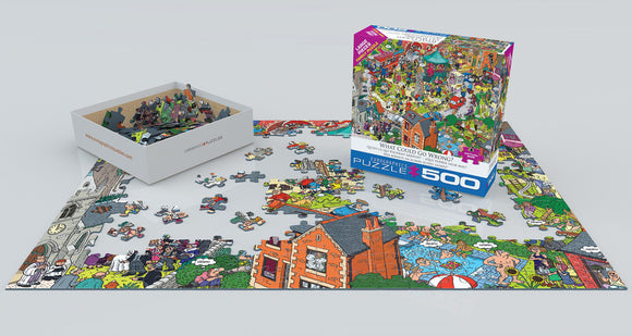 What Could Go Wrong? jigsaw puzzle by Eurographics featuring a vibrant, humorous scene with whimsical characters, 500 pieces spread out on a flat surface, with the box displayed alongside a partially completed puzzle.