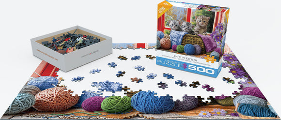 A jigsaw puzzle titled 'Knittin' Kittens' by EuroGraphics, featuring a colorful scene with kittens and yarn balls. The puzzle pieces are spread out on a table, with the box and another montage showing the image of the completed puzzle. It includes 500 large pieces, ideal for puzzlers of all ages.