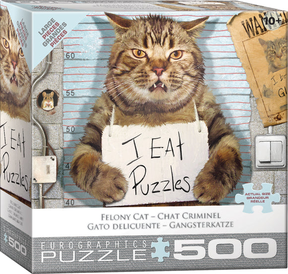 The Feline Felon jigsaw puzzle by Eurographics features a comical illustration of a large, grinning cat holding a sign that says 'I EAT Puzzles.' The background shows a height chart and wanted posters, adding to the playful theme of the puzzle. It is designed for puzzle enthusiasts with 500 large pieces, ideal for a fun and engaging activity.