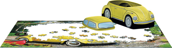 VW Beetle Camping Tin jigsaw puzzle from Eurographics featuring a yellow VW Beetle car. The puzzle is partially assembled, showing colorful landscape and puzzle pieces scattered around the image.