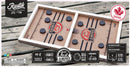Rustik Fast Sling Puck game by Family Games Inc. Features a wooden board with two sections for two players, aiming to shoot pucks into the opposing goal. Includes black pucks on a brown and white playing surface, designed for action and dexterity, suitable for ages 4 and up.