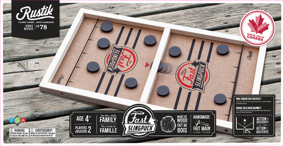 Rustik Fast Sling Puck game by Family Games Inc. Features a wooden board with two sections for two players, aiming to shoot pucks into the opposing goal. Includes black pucks on a brown and white playing surface, designed for action and dexterity, suitable for ages 4 and up.
