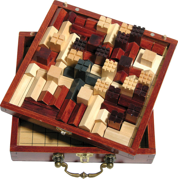A beautifully crafted wooden game set featuring a variety of interlocking pieces in different shapes, sizes, and colors, displayed in an elegant box with a brass clasp. The layout showcases the intricate design of the pieces, highlighting a mix of light and dark woods, ideal for strategic gameplay.