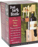 Box of the Don't Break the Bottle Original mechanical puzzle by Family Games Inc. The design features a wooden puzzler aimed at securing a wine bottle. The packaging includes colorful graphics, showcasing the puzzle's intricate setup, which captures the fun of solving to unlock the bottle. Text highlights its use as a gift for dinner parties, emphasizing that it does not include wine.