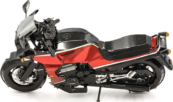 A detailed DIY model kit of the Kawasaki GPz900R motorcycle, featuring intricate metallic pieces in red and black. The model showcases realistic design elements including handlebars, wheels, and engine details, perfect for enthusiasts and collectors.