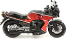A detailed model of the Kawasaki GPz900R motorcycle from the ICONX series by Fascinations. This DIY kit features intricate metal parts with a glossy black and red finish, showcasing the bike's iconic design and realistic features.