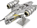 Detailed model of the Razor Crest spaceship from the Star Wars universe, made by Metal Earth. This DIY kit features intricate metal parts and stunning design elements, perfect for enthusiasts and collectors. The ship is displayed on a stand, showcasing its sleek metallic body and elaborate detailing, including engines and cockpit.