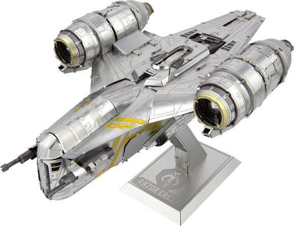 Detailed model of the Razor Crest spaceship from the Star Wars universe, made by Metal Earth. This DIY kit features intricate metal parts and stunning design elements, perfect for enthusiasts and collectors. The ship is displayed on a stand, showcasing its sleek metallic body and elaborate detailing, including engines and cockpit.