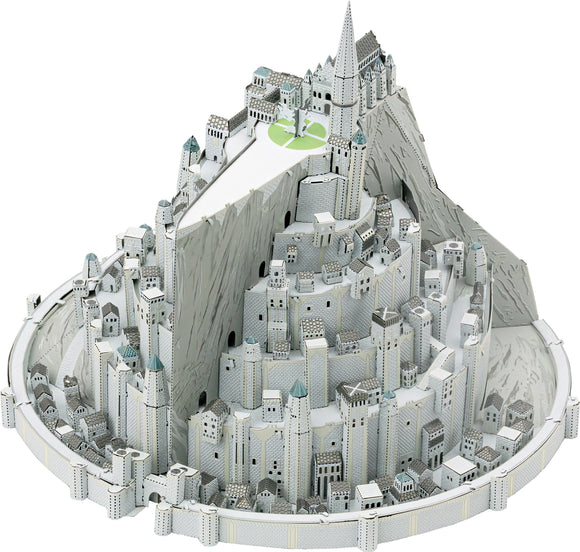 A detailed DIY model kit of Minas Tirith from the Lord of the Rings, showcasing its intricate architecture, layered cityscape, and iconic towers, all designed for assembly. The model features grey and white tones with accented rooftops, nestled against a mountainous backdrop.