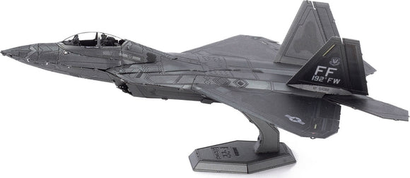 A detailed metallic model of an F-22 Raptor plane, showcasing its sleek design and intricate features. The model is mounted on a stand, making it suitable for display. Ideal for aviation enthusiasts and DIY project lovers, this kit allows for hands-on crafting and assembly, bringing the iconic fighter jet to life.