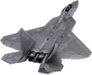 A detailed metal model kit of the F-22 Raptor plane by Fascinations. The model showcases intricate designs, featuring the plane's wings, cockpit, and engines, all in a metallic finish, perfect for DIY enthusiasts.