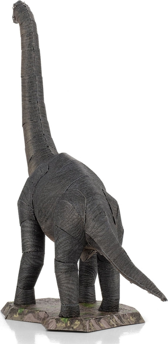 A detailed Metal Earth DIY kit of a Brachiosaurus model, showcasing its long neck and sturdy legs. Constructed from thin metal sheets, this intricate design highlights the textures and contours that mimic the appearance of the dinosaur. Ideal for enthusiasts and beginners alike, this model stands on a robust base, resembling a prehistoric environment.