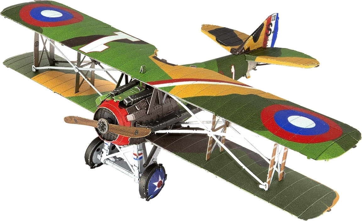 A detailed metal replica model of the Spad S. XIII airplane by Fascinations. The model features a vibrant green, brown, and red color scheme with circular insignia on the wings and tail. It showcases intricate metal craftsmanship and is designed for DIY assembly.