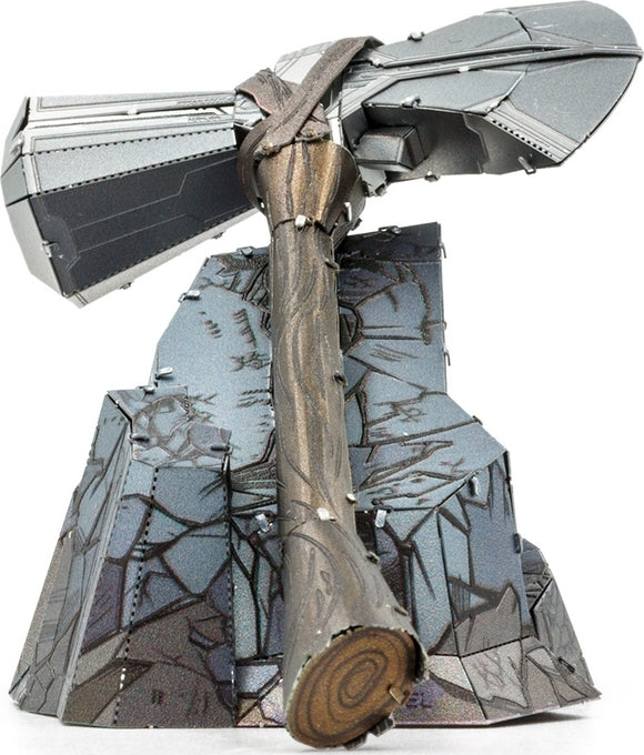 Metal Earth Stormbreaker DIY kit by Fascinations, featuring a detailed metal model of the mythical hammer, complete with intricate designs and a sturdy handle. The kit showcases a unique silver and bronze finish, emphasizing the beautiful craftsmanship and precision involved in its construction. Ideal for collectors and metal model enthusiasts.