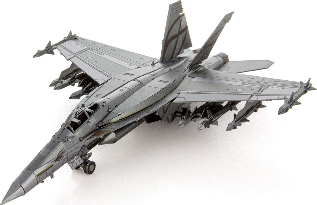 A detailed model of the 18 Super Hornet aircraft made from metal. The model showcases intricate designs, including wings, landing gear, and missile attachments, depicting high-quality craftsmanship typical of Metal Earth products. Ideal for DIY enthusiasts and aircraft fans, this kit offers a realistic representation of the fighter jet.