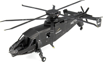 A detailed metal model of the S-97 Raider helicopter by Fascinations, showcasing intricate design elements and precision engineering. The model features a sleek black finish, spinning rotors, and is suitable for DIY enthusiasts.
