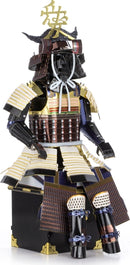 Metal Earth Samurai Armor DIY kit featuring an intricately detailed samurai figure crafted from metal. The armor is adorned with colorful layers and a striking headpiece, showcasing meticulous craftsmanship and design. Ideal for collectors and DIY enthusiasts.