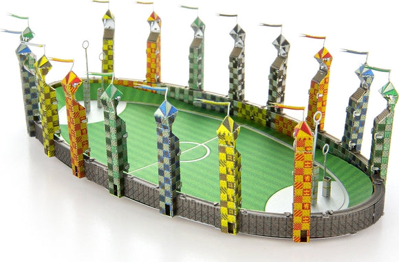 A detailed Metal Earth Quidditch Pitch DIY kit, showcasing brightly colored goal posts and towers resembling those from the Harry Potter series. The intricate design features various patterns and vibrant colors, set against a green playing field. Perfect for fans and collectors alike.