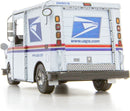 A detailed Metal Earth DIY kit featuring a model of the USPS LLV mail truck. The model showcases intricate designs and postal service branding with a striking white, blue, and red color scheme. It includes realistic features like taillights, wheels, and a cargo door, perfect for collectors and model enthusiasts who enjoy assembling intricate structures.