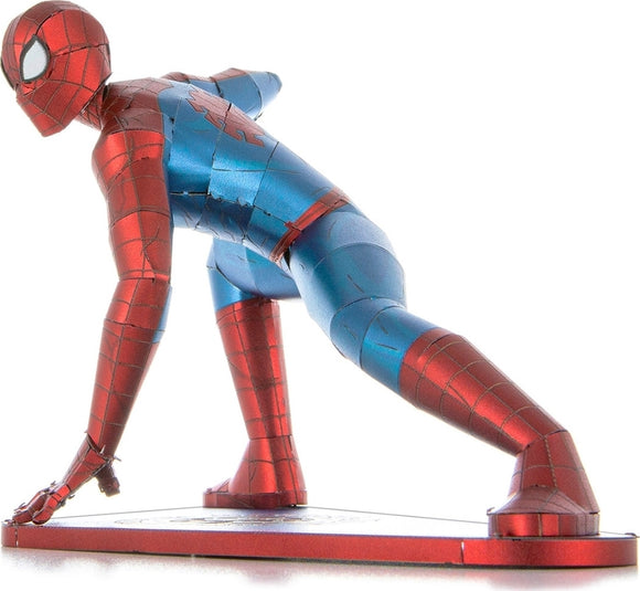 Metal Earth Spider-Man DIY kit by Fascinations featuring a detailed, metallic model of Spider-Man in a dynamic pose, showcasing vibrant red and blue colors with intricate web patterns.