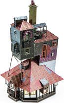 Intricate DIY model of 'The Burrow' from Metal Earth by Fascinations. The metal model showcases a whimsical multi-level house with a variety of roof shapes, windows, and a chimney, highlighting vibrant colors and detailed craftsmanship suitable for hobbyists.
