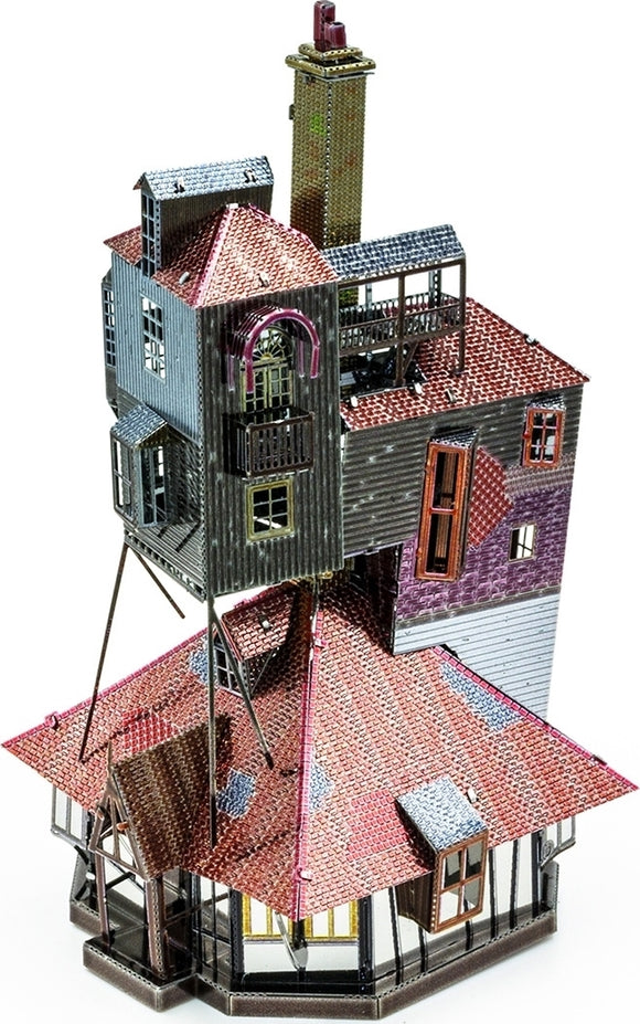 Intricate DIY model of 'The Burrow' from Metal Earth by Fascinations. The metal model showcases a whimsical multi-level house with a variety of roof shapes, windows, and a chimney, highlighting vibrant colors and detailed craftsmanship suitable for hobbyists.