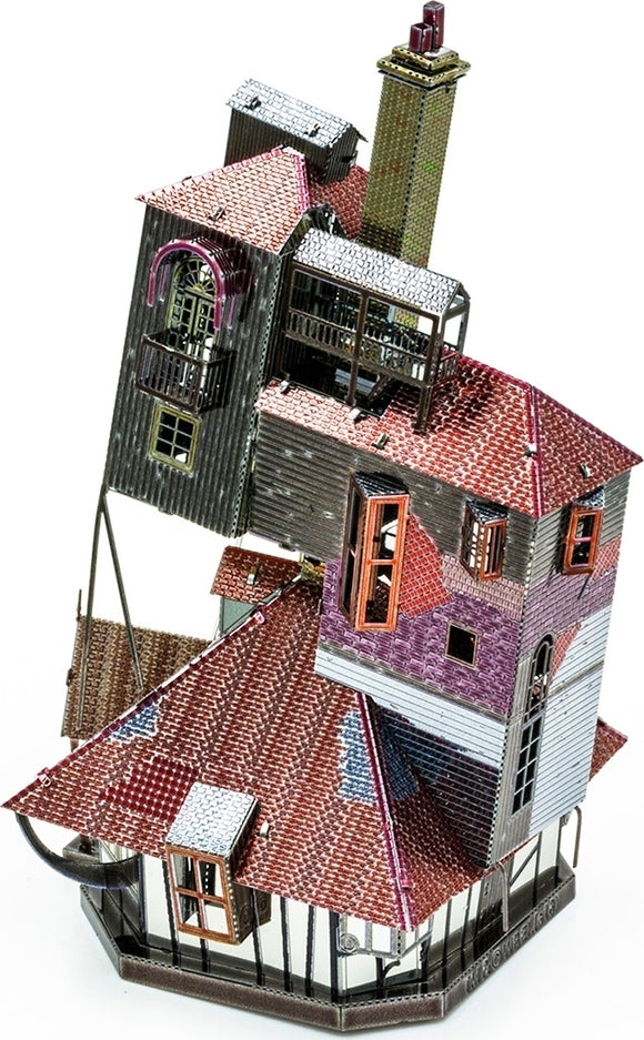 A colorful, detailed metal model kit of 'The Burrow' from Fascinations, showcasing intricate architectural features like windows, chimneys, and multiple roof types, perfect for DIY enthusiasts.
