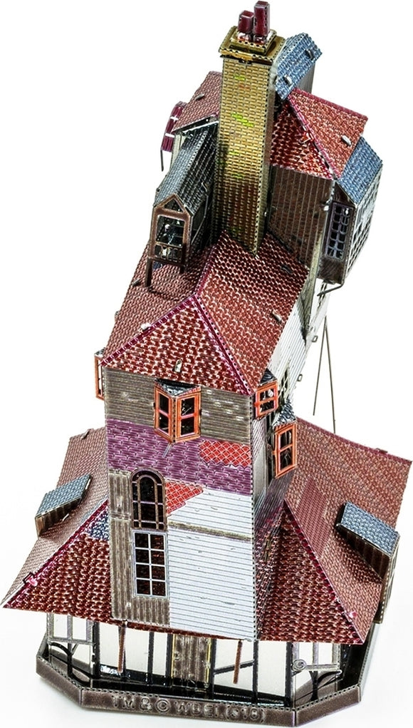 A detailed model of The Burrow from Metal Earth, showcasing a multi-layered cottage with vibrant red, blue, and silver roofs, intricate window designs, and a charming chimney. This DIY kit invites creativity and craftsmanship, perfect for enthusiasts.