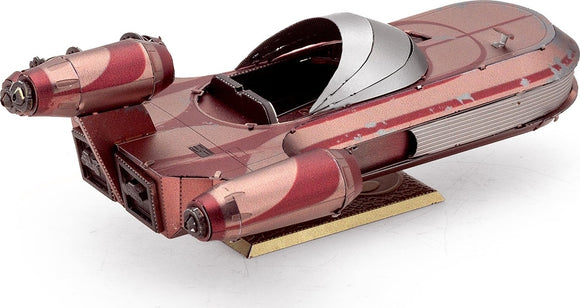 Metal Earth X-34 Landspeeder model kit by Fascinations. This intricately detailed metal model showcases the iconic design of the speeder with red and silver accents, featuring two prominent engines and a sleek, rounded body. Perfect for collectors and fans of sci-fi models.