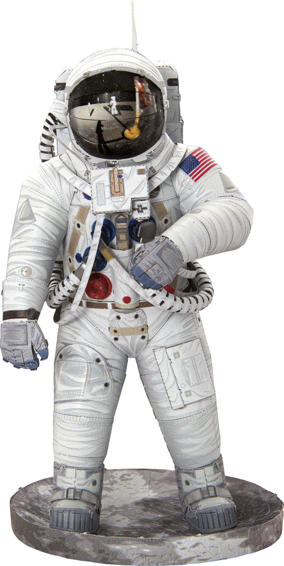 A detailed model of an Apollo 11 astronaut, showcasing intricate design elements such as the helmet's reflective visor, the American flag patch, and various equipment. The astronaut stands on a lunar-like base, embodying the spirit of space exploration.