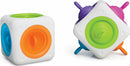 The tugl Cube by Fat Brain is a colorful, interactive fidget toy featuring spinning discs on its sides. The cube showcases various bright colors including orange, green, blue, and purple. Each side invites tactile play and encourages sensory exploration, making it ideal for stress relief and focus enhancement.
