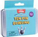 Teeny Town Bowling USA game by Fizz Creations Inc. The packaging features bright colors with bold text stating 'The World's Smallest Ten Pin Bowling.' It includes images of mini bowling pins and a bowling ball, along with a warning about small parts for children under 3 years. Attractive packaging in a compact tin.