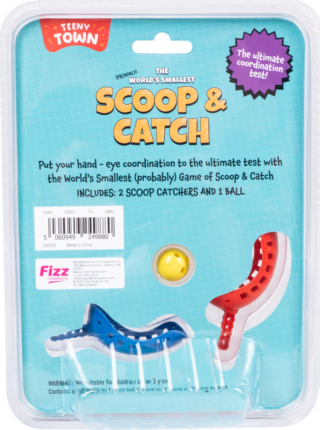 The Teeny Town Scoop and Catch game set featuring two colorful scoop catchers in blue and red, alongside a bright yellow ball, promoting hand-eye coordination. The packaging is light blue with playful graphics, indicating it's the world's smallest game. Perfect for kids aged 3 and up, ideal for fun coordination challenges.