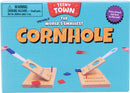 Teeny Town Cornhole Toss game featuring two small wooden boards and colorful bean bags in red and blue. The game promotes friendly competition with easy setup for quick matches.