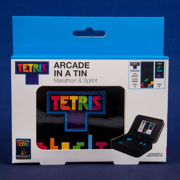 Tetris Arcade In A Tin by Fizz Creations Inc. features a vibrant, colorful design showcasing the iconic Tetris logo. The packaging includes the title 'Marathon & Sprint' with a visual of the game screen displaying gameplay elements. The compact tin design suggests a portable gaming experience, perfect for both solo and group play. The product is officially branded and offers a nostalgic gaming adventure.