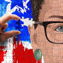 A jigsaw puzzle featuring an artistic depiction of Ruth Bader Ginsburg, showcasing her signature glasses and earring. A hand is placing a puzzle piece into the artwork, which is surrounded by vibrant blue and red colors, creating a striking visual effect.