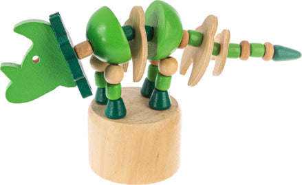 A colorful wooden dinosaur push puppet featuring a green dinosaur design with movable joints. The puppet is set on a round wooden base, showcasing playful and vibrant colors. Ideal for imaginative play and fine motor skills development.