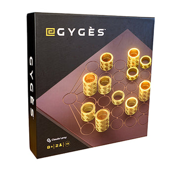 Gyges abstract strategy game box cover.  Brown board etched with circles with gold ring pieces on a black background
