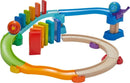 The Kubu Ball Track Kringel Domino is a colorful DIY toy set from HABA. It features a winding track with a mix of vibrant wooden blocks and a rolling ball, designed for engaging play. The track includes curves, straight sections, and domino-style blocks, inviting creativity and logical thinking in children as they build and create their own marble run.